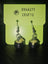 Handmade witch cauldron earrings with yellow beads and silver hooks displayed on a green card with black text and spider illustration