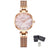 Elegant women's luxury quartz wristwatch with pink mother-of-pearl dial, crystal hour markers, rose gold mesh band, and water resistance