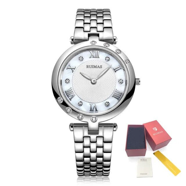 Silver luxury women's quartz bracelet watch with round face, crystal accents, Roman numerals, stainless steel band, elegant design
