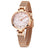 Elegant women's luxury quartz wristwatch with pink mother-of-pearl dial, crystal hour markers, rose gold mesh band, and water resistance