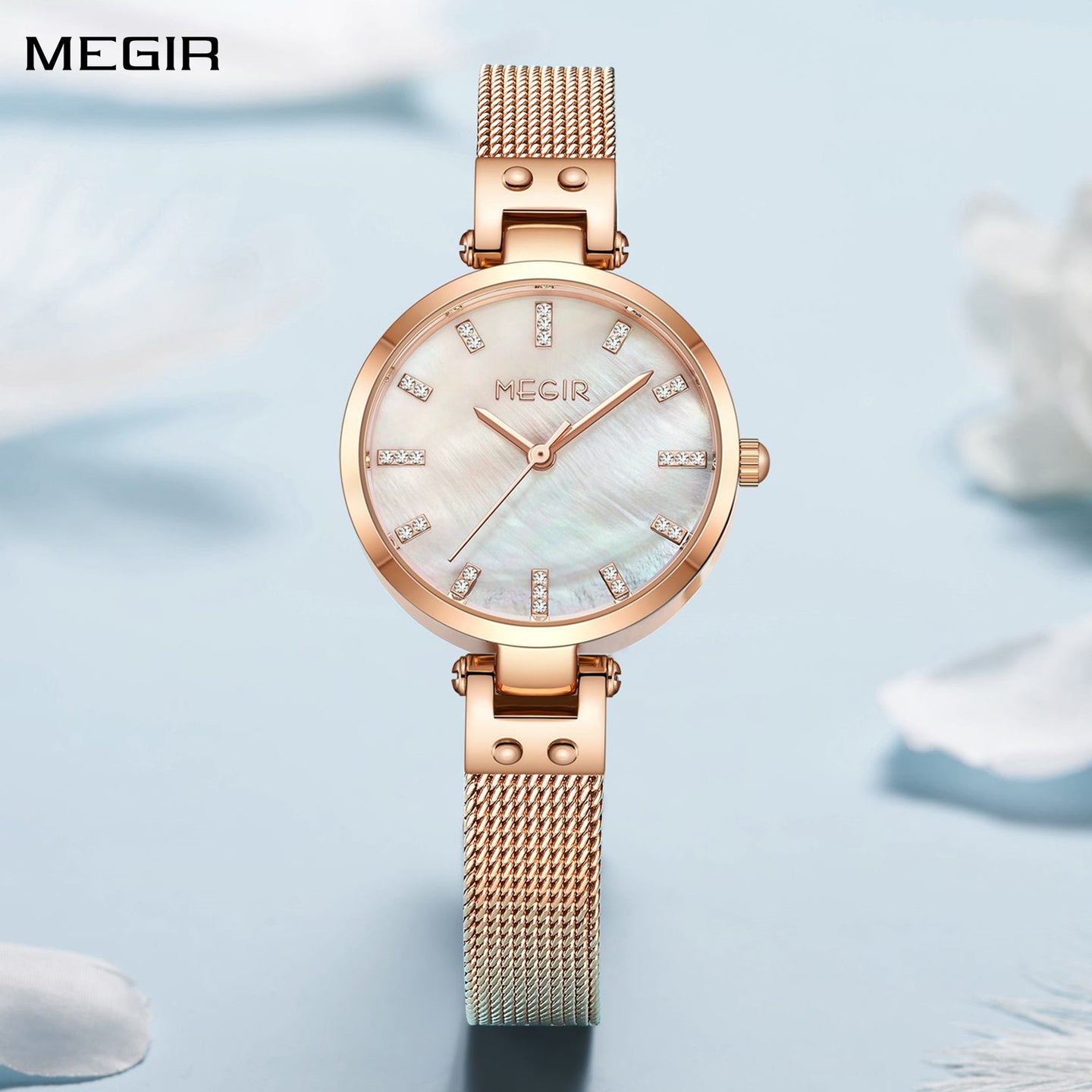 Elegant women's luxury quartz wristwatch with pink mother-of-pearl dial, crystal hour markers, rose gold mesh band, and water resistance