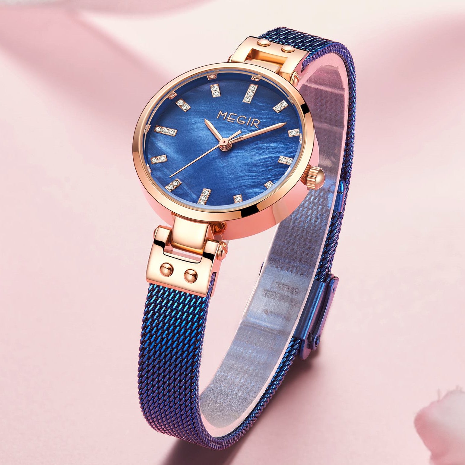 Elegant women's luxury quartz wristwatch with pink mother-of-pearl dial, crystal hour markers, rose gold mesh band, and water resistance