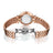 Silver luxury women's quartz bracelet watch with round face, crystal accents, Roman numerals, stainless steel band, elegant design