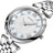 Silver luxury women's quartz bracelet watch with round face, crystal accents, Roman numerals, stainless steel band, elegant design