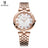 Silver luxury women's quartz bracelet watch with round face, crystal accents, Roman numerals, stainless steel band, elegant design