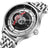 Black men's luxury automatic mechanical watch with a round dial, intricate skeleton design, stainless steel strap, and modern style