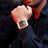 Black and orange MEGIR 2218 men's military chronograph watch with skeleton dial, silicone strap, and multiple subdials for outdoor sports
