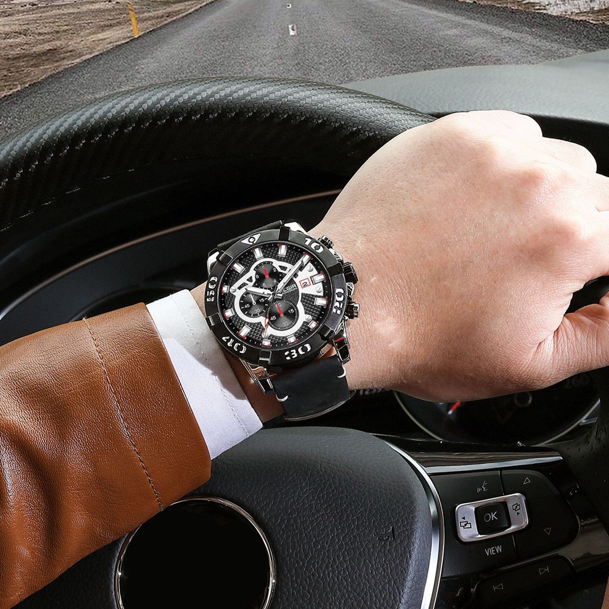 Luxury men's chronograph sports watch with large 48.5mm black bezel, black leather strap, rose gold case, and detailed dial with subdials and date window