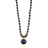 Elegant beaded necklace featuring deep blue lapis lazuli stones and gold accents with a round lapis lazuli pendant, perfect for sophisticated style.
