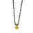 Elegant beaded necklace featuring deep blue lapis lazuli stones and gold accents with a round lapis lazuli pendant, perfect for sophisticated style.