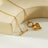 Gold heart toggle pendant necklace with a shiny gold finish, featuring a heart-shaped charm and toggle clasp, perfect for everyday wear or gifting.