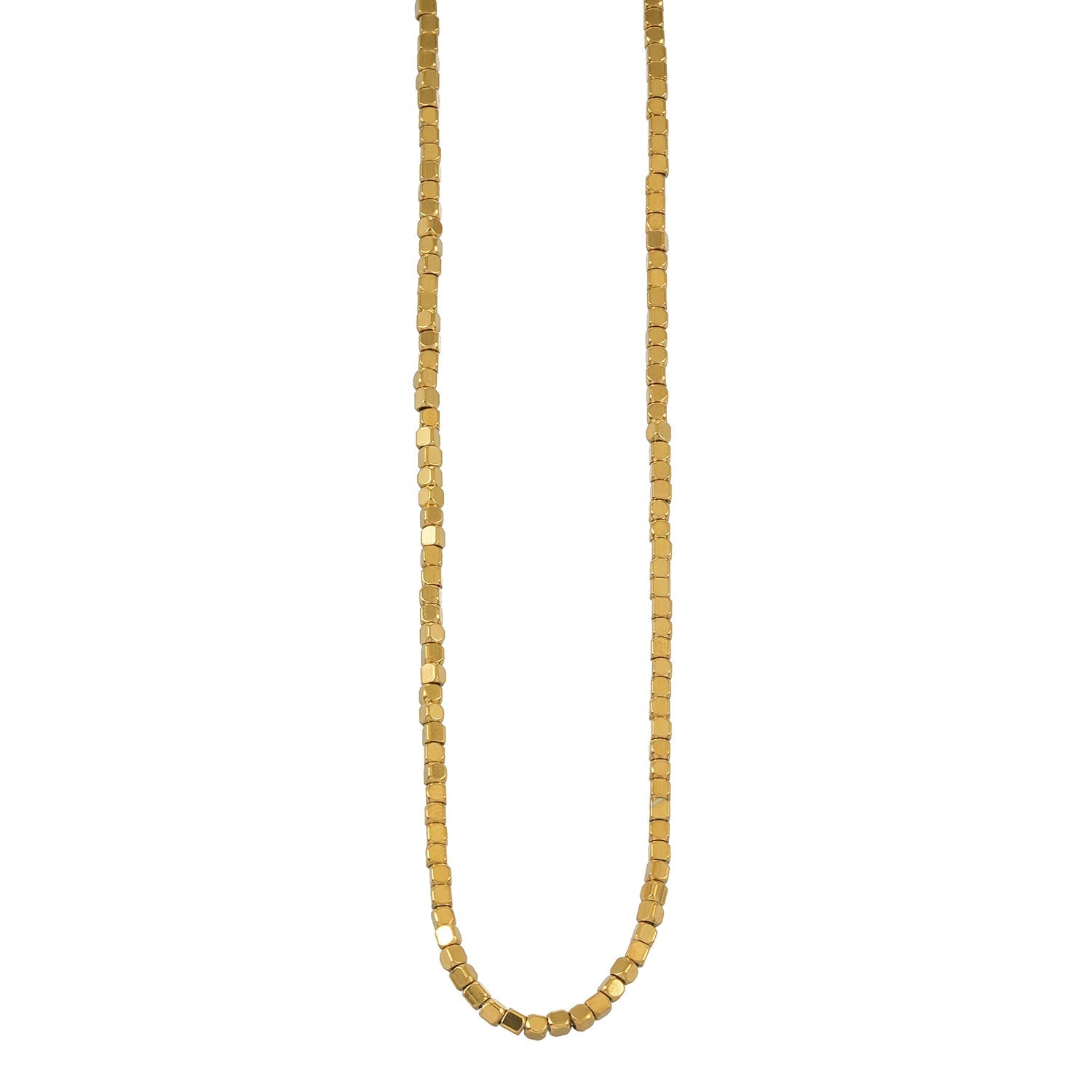 Gold beaded dainty chain necklace with small square beads, resting on a decorative ceramic dish with a scalloped edge, ideal for layering or everyday wear